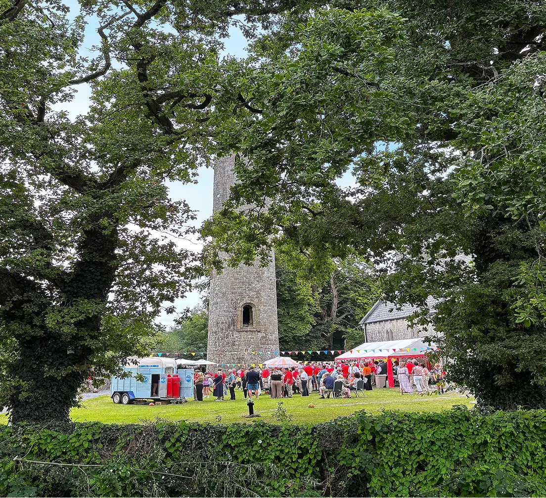 Green parklands surrounding the tower.